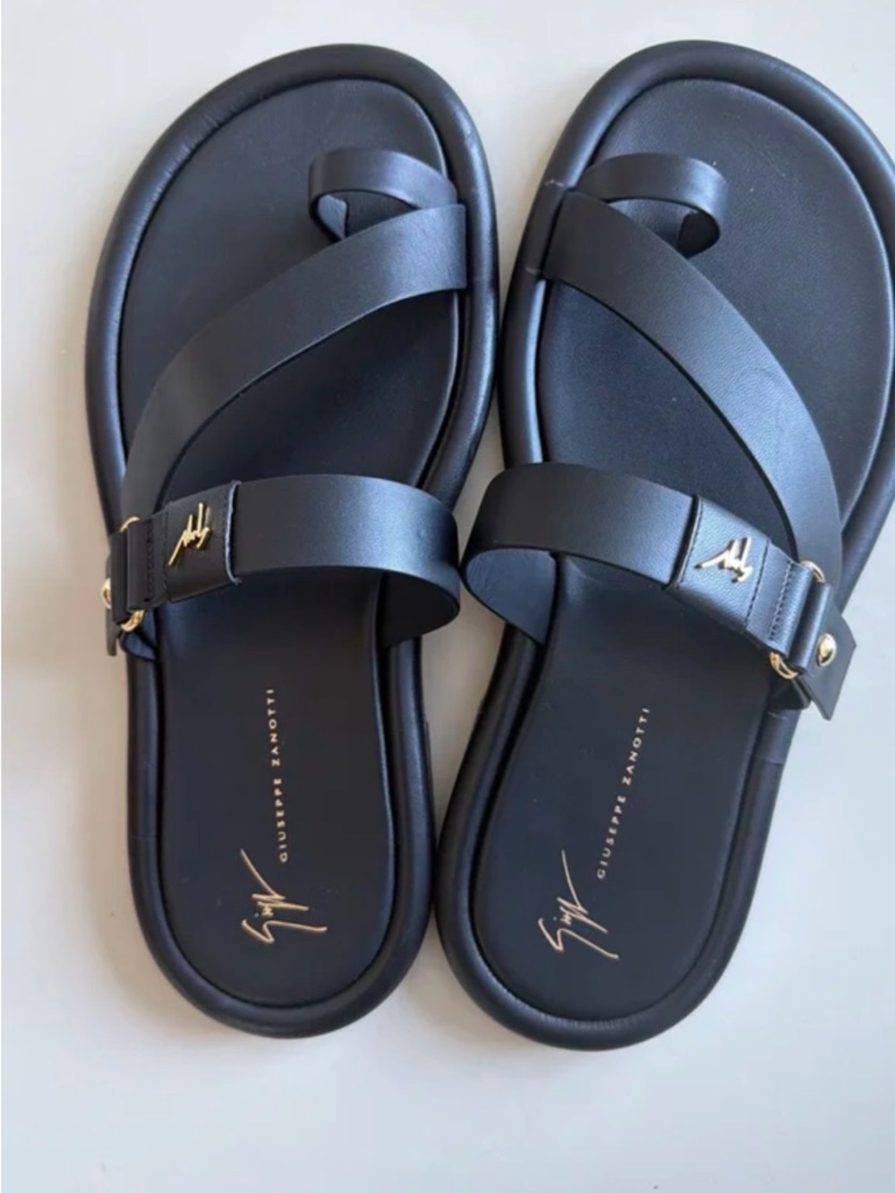 Giuseppe Zanotti Black Leather Cross-Strap Sandals with Gold Accents